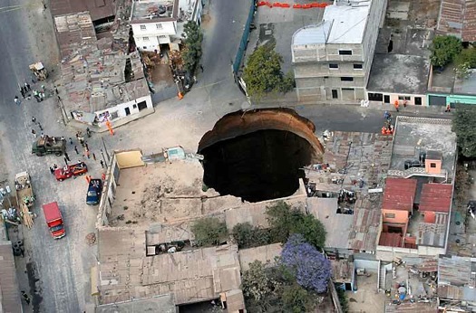 huge sink hole seen from helicopter